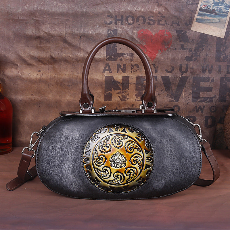 Cowhide diagonal handbag